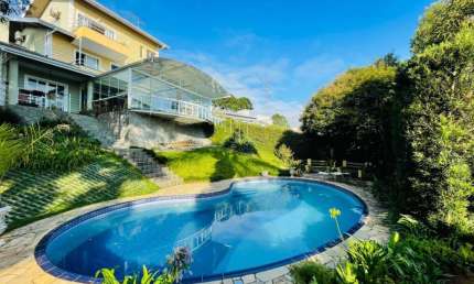 CASA A VENDA COM 04 DORMITORIOS - 03 SUITES - CONDOMINIO FECHADO TEODORO DE BONA