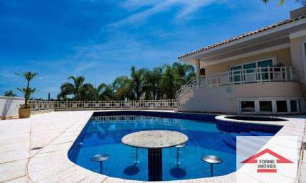 Casa com 4 suítes à venda no Condomínio Terras de São Carlos, 711 m² por R$ 3.900.000 - Terras de São Carlos - Jundiaí/SP