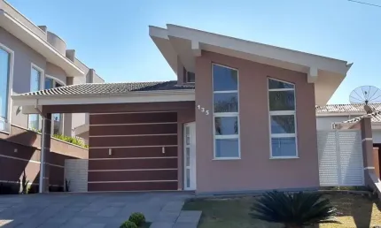 Casa com 3 dormitórios à venda, 255 m² por R$ 1.650.000,00 - Condomínio Residencial Terras do Caribe - Valinhos/SP