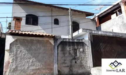 SOBRADO COM 2 DORMITÓRIOS (1 SUITE), COM CHURRASQUEIRA E 2 VAGAS DE GARAGEM COBERTAS