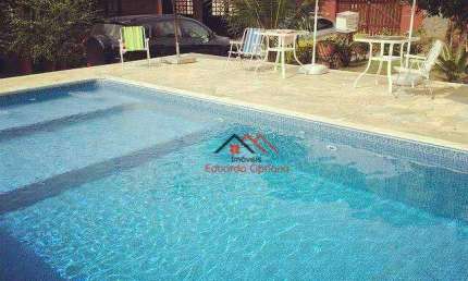 Casa com 4 dormitórios à venda, 228 m² por R$ 980.000,00 - Massaguaçu - Caraguatatuba/SP