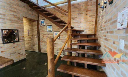 Casa com 4 dormitórios à venda, 239 m² por R$ 870.000,00 - Massaguaçu - Caraguatatuba/SP