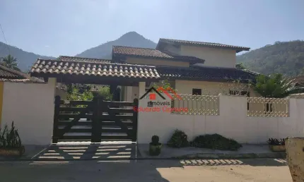 Sobrado com 4 dormitórios à venda, 300 m² por R$ 1.200.000,00 - Condomínio Verde Mar - Caraguatatuba/SP