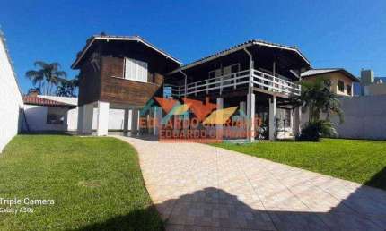 Casa com 4 dormitórios à venda, 150 m² por R$ 630.000,00 - Massaguaçu - Caraguatatuba/SP