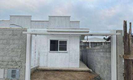 Casa com 2 dormitórios à venda, 53 m² por R$ 370.000,00 - Massaguaçu - Caraguatatuba/SP