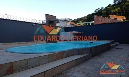 Casa com 3 dormitórios à venda, 111 m² por R$ 690.000,00 - Massaguaçu - Caraguatatuba/SP