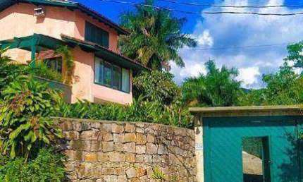 Casa com 3 dormitórios à venda, 278 m² por R$ 1.200.000,00 - Condomínio Verde Mar - Caraguatatuba/SP