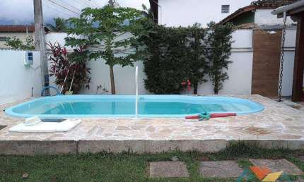 Casa com 3 dormitórios para alugar por R$ 4.095,46/mês - Jardim Mariella - Caraguatatuba/SP