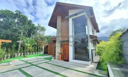 Sobrado com 3 dormitórios à venda, 220 m² por R$ 2.200.000,00 - Massaguaçu - Caraguatatuba/SP