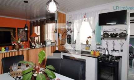 Casa com 4 dormitórios à venda, 157 m² por R$ 1.060.000,00 - Parque Novo Mundo -