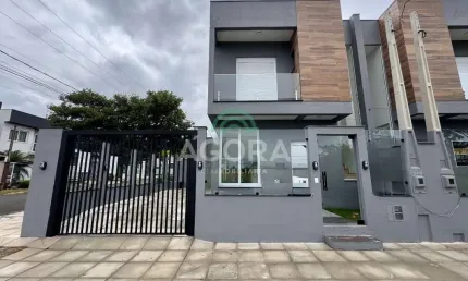 Sobrado com 2(duas) suítes, localizado no bairro mont serrat em canoas