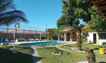 Casa quatro quartos sendo duas suítes 200 metros da lagoa