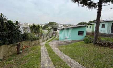 TÉRRENO COM 390M² COM 3 CASAS PEQUENAS EXECELENTE PARA INVESTIMENTO. AGENDE SUA VISITA E VENHA CONHECER. F: 51 98410.2913