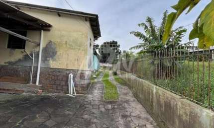 TÉRRENO COM 390M² COM 5 CASAS PEQUENAS EXECELENTE PARA INVESTIMENTO. AGENDE SUA VISITA E VENHA CONHECER. F: 51 98410.2913