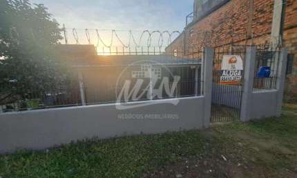 CASA DE 2 DORMITÓRIOS, SALA, SALA DE JANTAR, COZINHA AMPLA, BANHEIRO,  ÁREA DE SERVIÇOS. RUA CAMARGO CORRÉA 45 - CAMPO NOVO. CONTRATO DE LOCAÇÃO POR GARANTIA SEGURO FIANÇA. LIGUE - 51.984102913.
