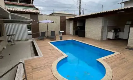 CASA COM ÁREA DE LAZER COMPLETA EM SANTA MÔNICA GUARAPARI...