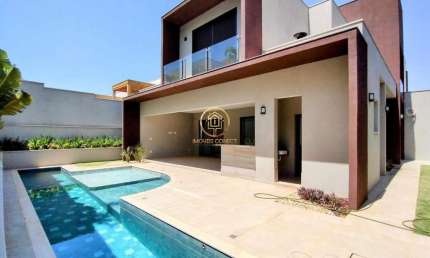 Casa em condomínio á venda de 382m²,4 suítes no Alphaville Dom Pedro/ Campinas