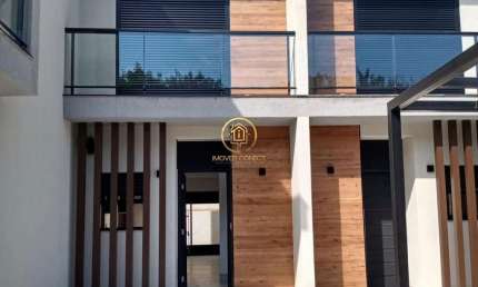 Casa em condomínio á venda de 74m², com 2 dormitórios sendo 2 suítes no Bairro d