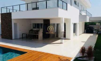 Casa em condomínio á venda de 368m2, com 4 dormitórios e 4 suítes no Loteamento