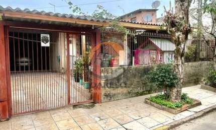 EXCELENTE CASA DE ALVENARIA COM 4 DORM. EM LOCALIZAÇÃO PRIVILEGIADA