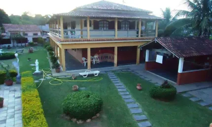 CASA COM 7 QUARTOS E 7 SUITES COM PISCINA ,CHURRASQUEIRA , SAUNA  E MUITO ESPAÇO  5 VAGAS.