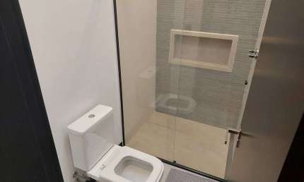 Casa com 4 suítes, 4 vagas de garagem, e 372 m² privativos em Ibiraquera - Imbituba/SC