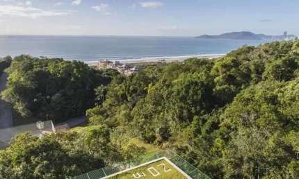 Apartamento frente mar com 4 suítes, 4 vagas de garagem na Praia Brava em Itajaí
