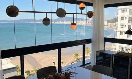 Apartamento alto padrão vista mar com 3 suítes e 2 vagas de garagem em Itapema