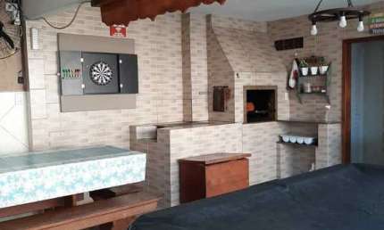 Casa com 6 dormitórios sendo 3 suítes á 250 metros do mar no bairro Armações em Balneário Piçarras