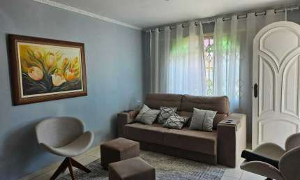 Casa com 3 dormitórios e 2 vagas de garagem na Bela Vista em São Jose