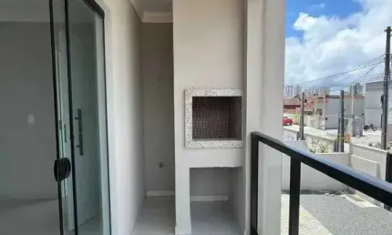 Geminado com 3 dormitórios sendo 1 suíte, sacada com churrasqueira e 1 vaga em barra velha
