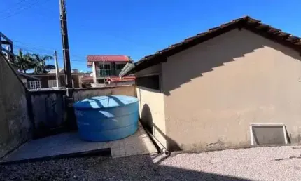 Terreno de 340m² com casa de 2 dormitórios e 1 vaga de garagem zimbros