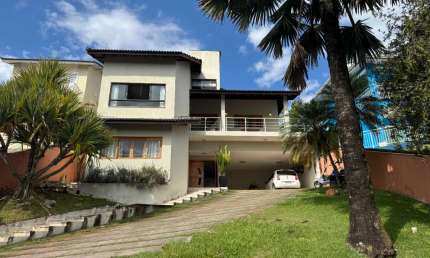 Casa no condomínio Ariujá Hills III para venda com 4 quartos, sendo 4 suítes, 570m²