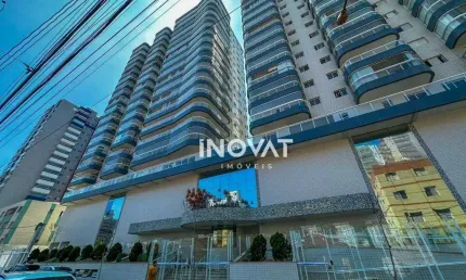 Apartamento em praia grande com vista para o mar e lazer completo