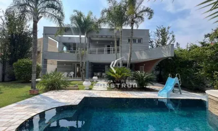 Casa em condomínio fechado com 5 quartos à venda na Avenida Araçá, 168, Alphaville, Campinas