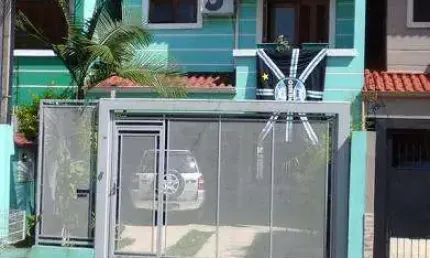 Casa com 3 quartos à venda na Rua dos Guenoas, 897, Guarujá, Porto Alegre