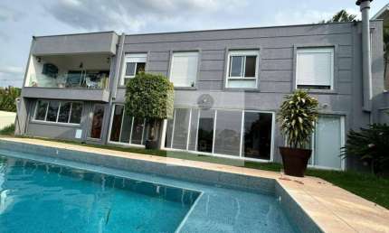 Casa com 5 dormitórios, 402 m² - venda por R$ 2.650.000,00 ou aluguel por R$ 16.554,91/mês - Caminhos de San Conrado - Campinas/SP