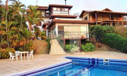 Casa com 4 quartos, sendo 4 suítes - 344 m² - venda por R$ 2.490.000 ou aluguel por R$ 13.940/mês - Condomínio Moinho de Vento - Valinhos/SP