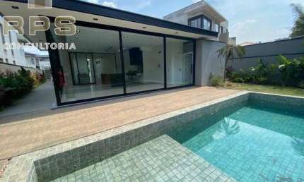 Casa à venda no Granville em Atibaia, térrea, 4 suítes- 1 master com closet,, cozinha e área gourmet integradas, piscina em meio a natureza