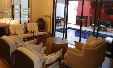 Casa de Alto Padrão para Venda na Vila Giglio em Atibaia, 03 suítes com closet, amplas salas e área gourmet completa integrada com piscina e spa.