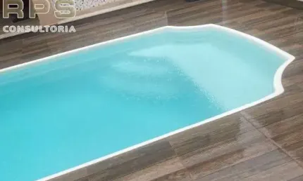 Casa no Nova Cerejeiras com 02 suites Sala de estar e sala de jantar  Lavabo, 02 banheiros, 02 vagas ,Quintal , lavanderia  Churrasqueira e piscina