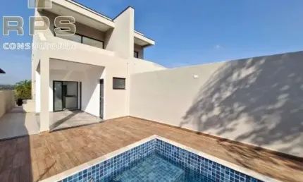 Casa pronta para morar no jardim paulista em atibaia, 3 suítes com sacadas, salas e cozinha integradas, espaço gourmet, piscina e área verde!