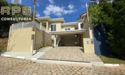 Casa térrea em Condomínio fechado em Atibaia , com 03 suites sendo 01 com closet , área gourmet com churrasqueira e piscina com hidro , 04 vagas