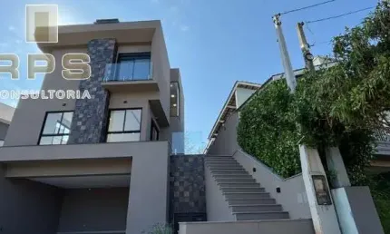Casa alto padrão no terras de atibaia, 2 suítes e quarto reversível com banheiro completo, área de lazer completa, sala e cozinha em conceito aberto.