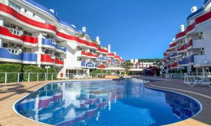 Apartamento próximo à praia, ideal para investimento.