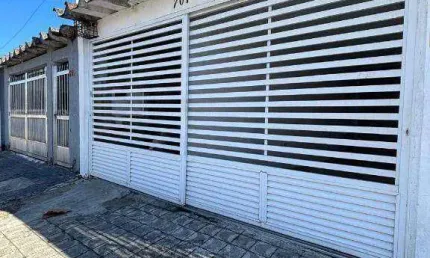 Casa com 2 dormitórios à venda, 120 m² por R$ 425.000 - Vila Guilhermina - Praia Grande/SP