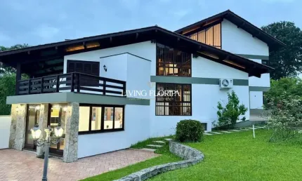 Casa em condomínio fechado com 4 quartos à venda na Rodovia Haroldo Soares Glavan, 1900, Cacupé, Florianópolis por R$ 2.900.000