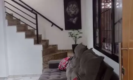 Casa sobrado 3 suites área gourmet 2 vagas de garagem guilhermina praia