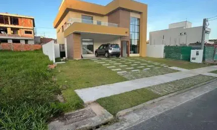 Casa em condomínio fechado com 4 quartos à venda na Rua Guarajuba, Alphaville (Abrantes), Camaçari