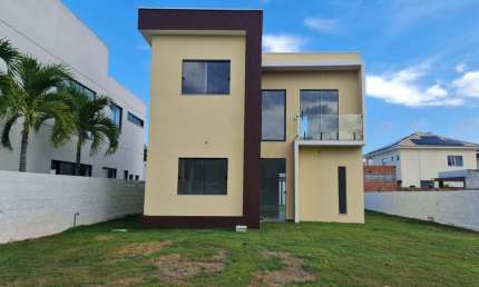 Casa em condomínio fechado com 4 quartos à venda no Abrantes, Camaçari  por R$ 750.000